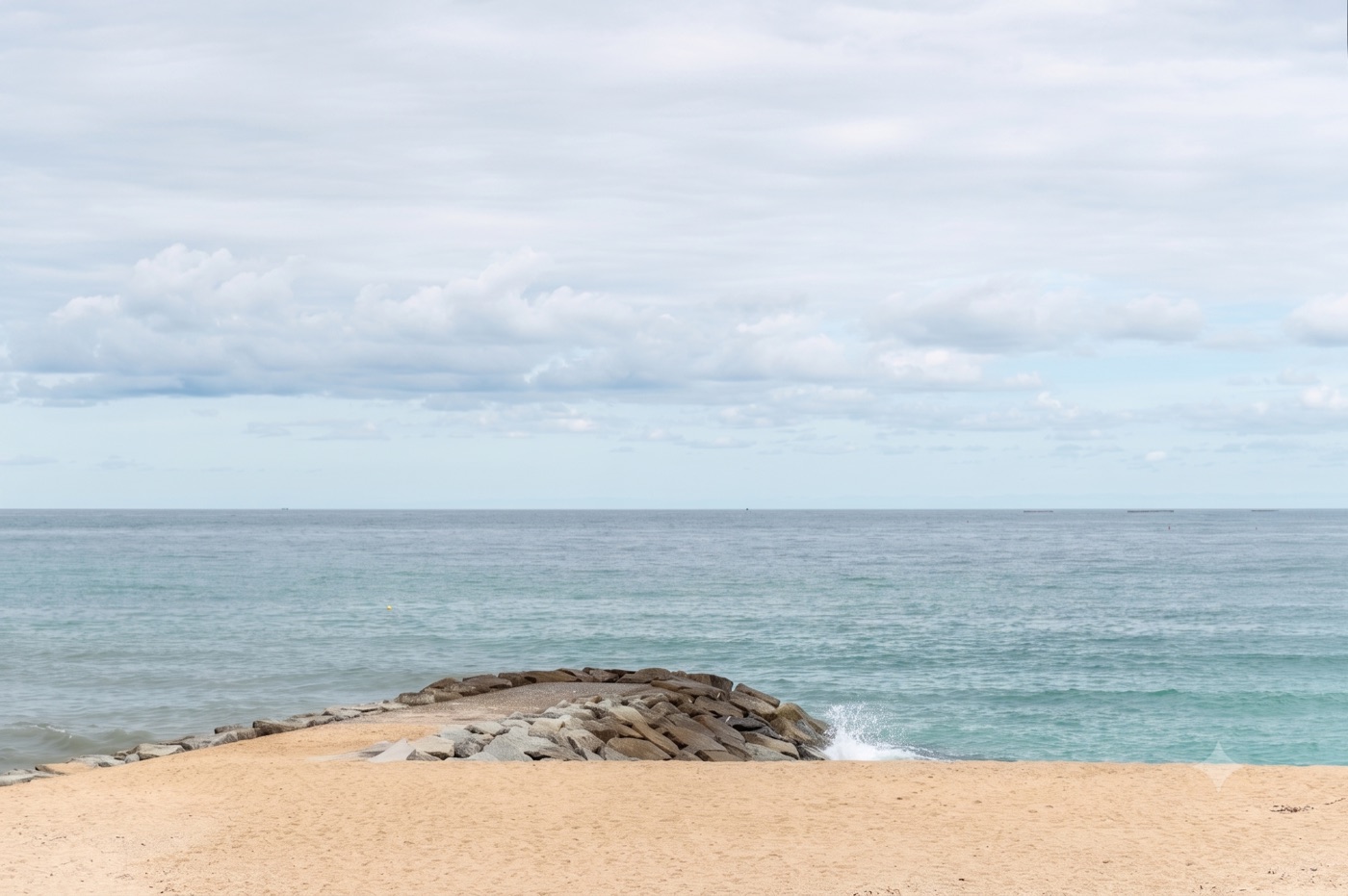 The stone breakwater jutting into the East Sea at Jumunjin, Gangneung