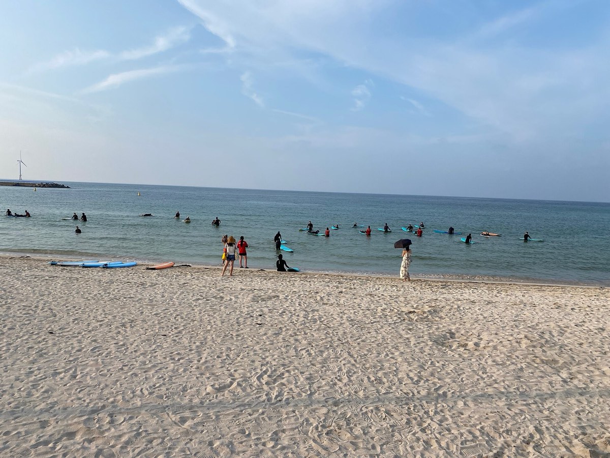 The white sand and aquamarine water of Woljeongri Beach, Jeju